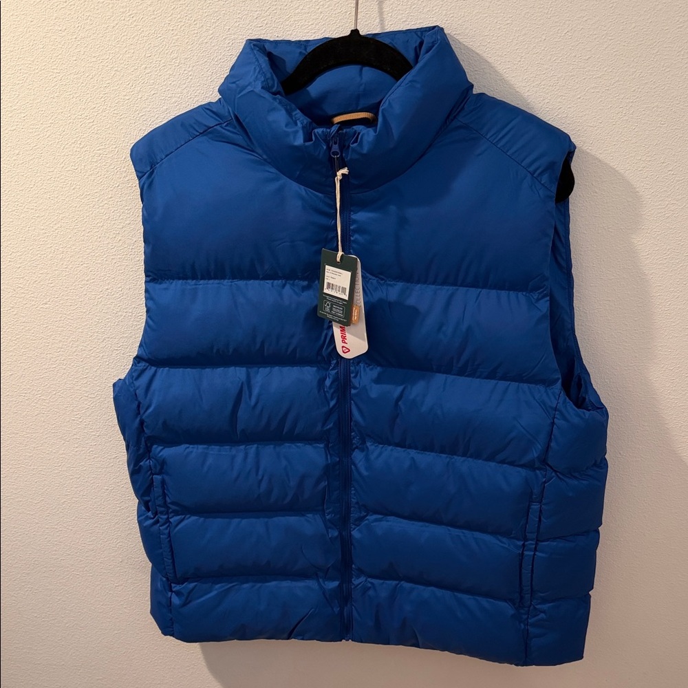 tentree navy blue vest with orange logo accents